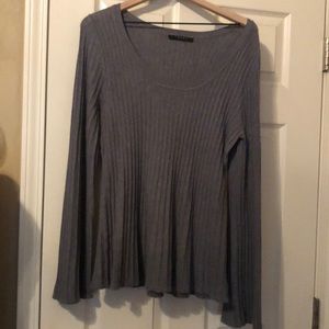 Grey sweater bell sleeve with flair at the bottom